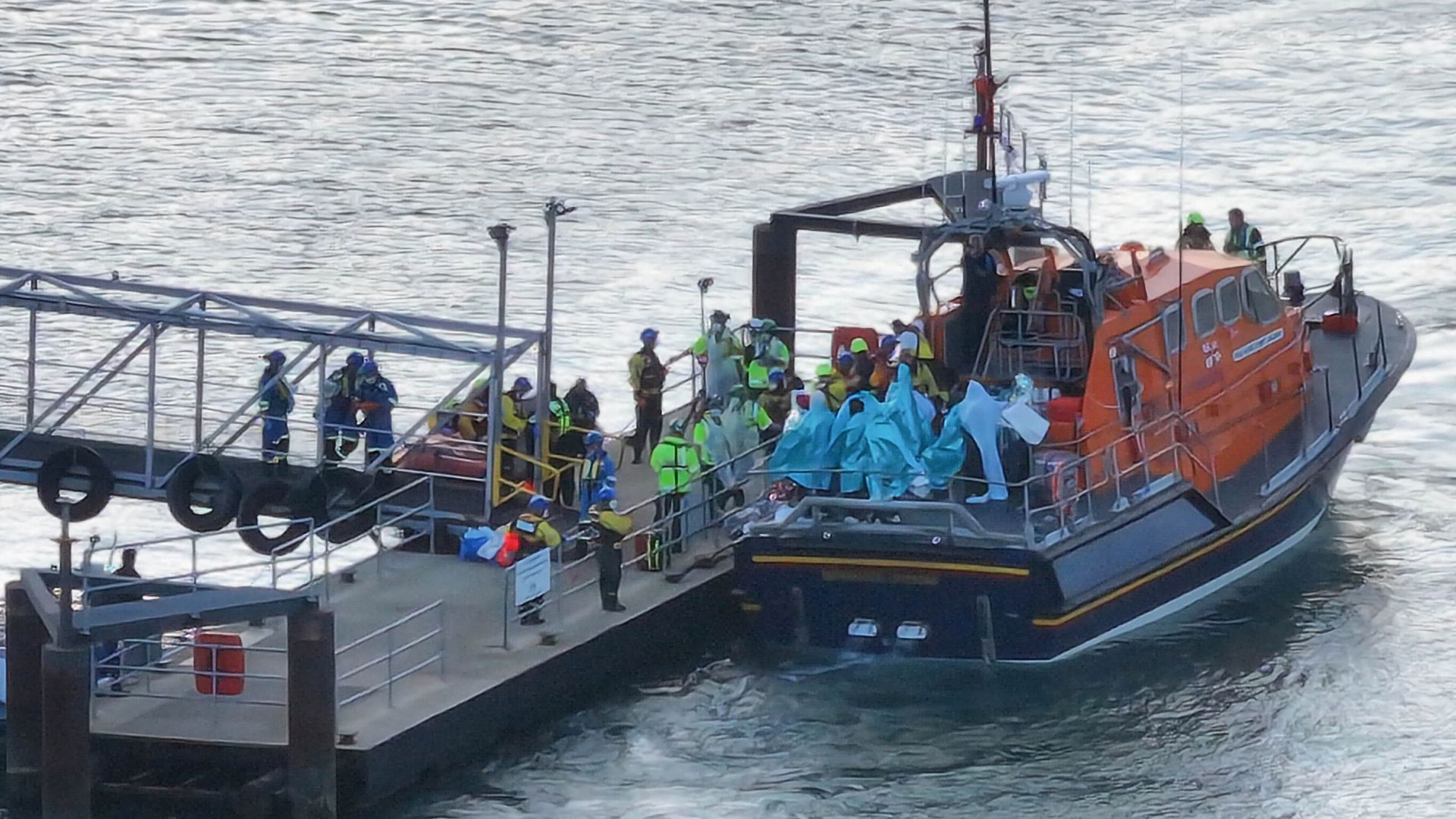 Police release images of six men after anti-migrant protest in Portsmouth