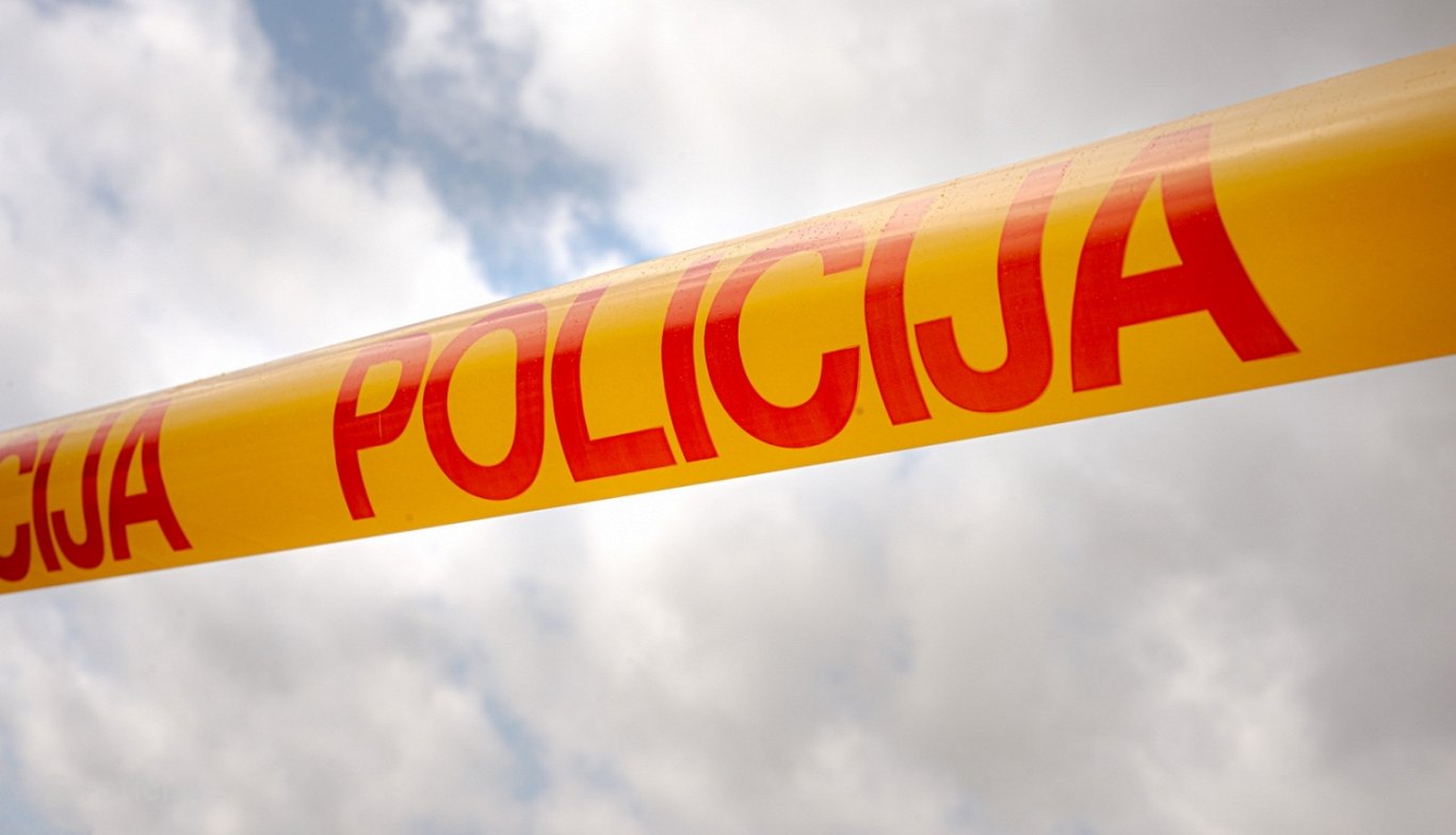 Dead body found in trash bags; two suspects detained